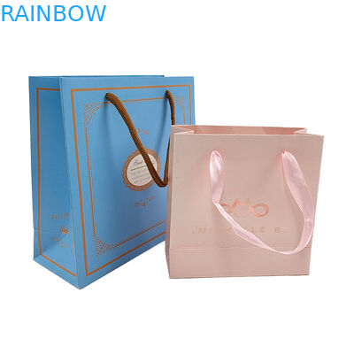 White Kraft Paper Shopping Clothing Cosmetic Perfume Gift Bag Luxury Handle Custom Logo Printed Paper Bag untuk Pakaian