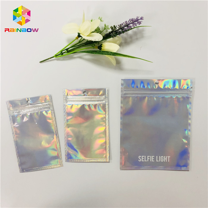 Tas Kemasan Kosmetik Kustom Hologram Plastik Mylar Zipper Dengan Jendela Jelas